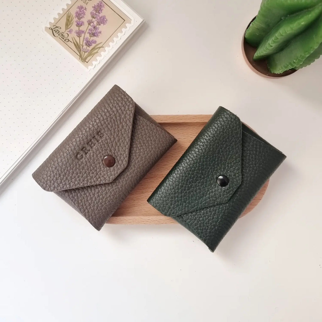 Pequeña cartera de cuero para monedas, ideal para uso diario