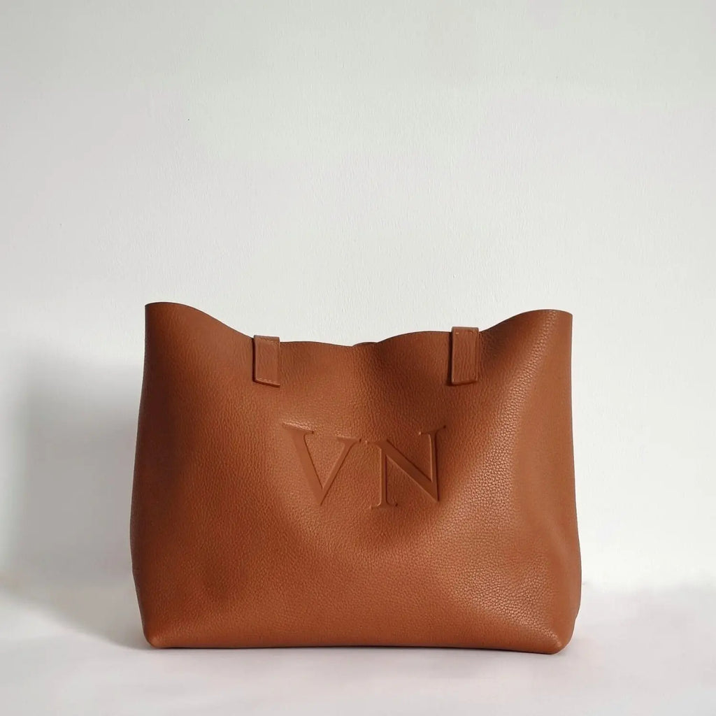 Bolso versátil y elegante de cuero auténtico, ideal para el día a día