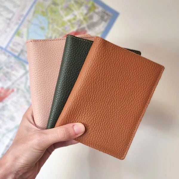 Handcrafted leather minimalist passport cover with card slots, handmade by leathergoods43