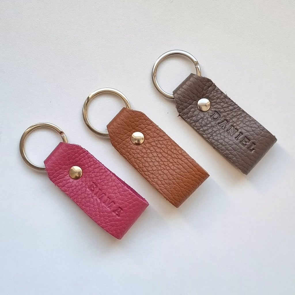 Elegant leather keyring with delicate engraving, artisan-crafted