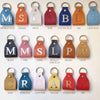 Handmade leather keychain personalized with initial and metal finish of choice