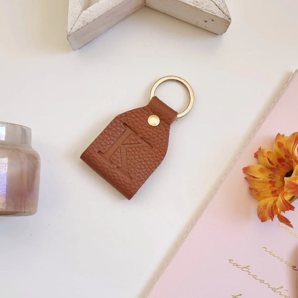 Handmade leather keychain with custom engraving for women by leathergoods43